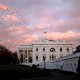 Image: A rainbow appears over the White House as birds fly nearby following a storm in Washington