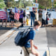 Protesters rallied against maks outside of Hewes Middle School in Tustin, Calif., on August 13, 2021, a day after a student refused to wear a face mask on the first day of school and was sent to wait outside the school's front office.