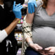 Pregnant women receive the COVID-19 vaccine in Schwenksville, Pennsylvania