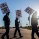United Auto Workers picket outside of John Deere Des Moines Works on Oct. 14, 2021, in Ankeny, Iowa.
