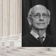 Photo Illustration of Justice Stephen Breyer, the American flag, and the Supreme Court columns.