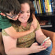 Christina Montoya Fiedler with her son using Qubii