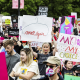 Abortion rights demonstrators and advocates march during the \"Bans Off Our Bodies\" rally from the National Mall to the Supreme Court in Washington on May 14, 2022.