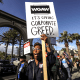 Actor and writer Daheli Hall cheers as she joins WGA members on the first day of their strike in front of Paramount Studios in Hollywood, Calif., on May 2, 2023.
