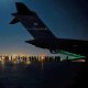 Evacuees board a U.S. Air Force C-17 Globemaster III at Hamid Karzai International Airport in Kabul, Afghanistan, on Aug. 20, 2021.