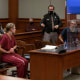James and Jennifer Crumbley appear in court Dec. 14, 2021, in Rochester Hills, Michigan, in the case of the deadly Oxford High School shooting.