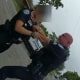The November 19 incident shows  the sergeant grabbing the officer's neck. 
The officer's face was blurred by the Sunrise Police Department.