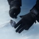 Collecting a meteorite on the Nansen blue ice area, close to the Belgian Antarctic research station Princess Elisabeth.