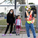 A school crossing guard wears a face mask outside Sadler Elementary School on Jan. 4, 2022, in Orlando, Fla.