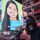 A vigil in New York's Times Square for Michelle Alyssa Go on Jan. 18, 2022.