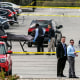 Officials load a body into a vehicle at the site of a mass shooting at a FedEx facility in Indianapolis, Indiana, on April 16, 2021.