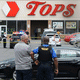 Photos from the scene of a mass shooting at a Tops supermarket store in Buffalo, N.Y., on Saturday.