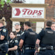 Buffalo Police respond to a mass shooting at a Tops Friendly Market on May 14, 2022, in Buffalo, N.Y.