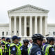 Police stand outside the Supreme Court building during a nationwide rally in support of abortion rights on May 14, 2022.