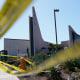 Crime scene tape surrounds Geneva Presbyterian Church on Tuesday, May 17, 2022, in Laguna Woods, Calif.