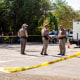Crime scene tape surrounds Robb Elementary School in Uvalde, Texas, on May 25, 2022.