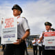 Delta Airlines pilots take part in an informational picket at Minneapolis-St. Paul International Airport, on Sept. 15, 2016.
