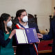 Image: Chilean President Gabriel Boric holds up the final version of the country's proposed, new constitution during a ceremony on July 4, 2022 in Santiago, Chile.