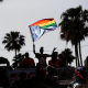 People celebrate during the Tampa Pride Parade on March 26, 2022 in Tampa, Fla.