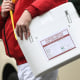 A driver carries an empty styrofoam box used for transporting human organs to his van at the Vivantes Neukoelln clinic on Sept. 28, 2012 in Berlin.