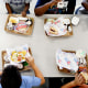 Students eat their lunch in the cafeteria at Doby Elementary School in Apollo Beach, Florida on October 4, 2019.