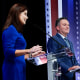 Rebecca Kleefisch and Tim Michels during a televised Wisconsin Republican gubernatorial debate on July 24, 2022, in Milwaukee.