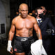 Mike Tyson exits the ring after receiving a split draw against Roy Jones Jr. at Staples Center on Nov. 28, 2020 in Los Angeles.