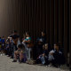 Migrants line up as they wait to be processed by US Border Patrol after illegally crossing the US-Mexico border in Yuma, Ariz. on July 11.