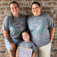 Emily and Jennifer Parker, right, with their daughter Zoey on Aug. 3, 2022, the day they adopted her.