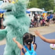 Image: A viral video appears to show a mascot ignoring Black children at Sesame Place in Philadelphia.