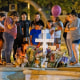 Image: Family and relations of Alexandria Rubio, 10, gather at a makeshift memorial to the victim of the Robb Elementary mass shooting, in the town square of Uvalde, Texas, May 27, 2022.