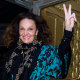 Diane von Furstenberg giving peace sign in New York City