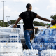 Cases of bottled water are handed out at a Mississippi Rapid Response Coalition distribution site