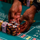 A craps dealer prepares stacks of chips at Caesars Palace on the Las Vegas Strip on June 4, 2020.