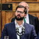 Image: Chilean President Gabriel Boric, right, speaks next to the new Minister of the Interior and Public Security, Carolina Toha, left, during a ceremony at La Moneda presidential palace in Santiago, on Sept. 6, 2022