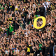 Oregon students and fans cheer the during the first half of an NCAA college football game against BYU, in Eugene, Ore., on Sept. 17, 2022.