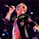 Chris Martin of Coldplay performs on Aug. 23, 2022, in Glasgow, Scotland.