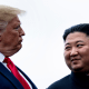Former President Donald Trump and North Korea's leader Kim Jong-un talk before a meeting in the Demilitarized Zone on June 30, 2019 in Panmunjom, Korea. 