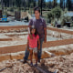 Inez Salinas and her daughter, River, at the site of their new house in Concow, Calif., on Sept. 1, 2022.