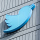 Image: The Twitter logo is seen on a sign on the exterior of Twitter headquarters in San Francisco, California.