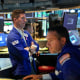 Traders work on the floor of the New York Stock Exchange on Nov. 10, 2022.