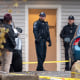 Officers investigate a homicide at an apartment complex south of the University of Idaho campus on Sunday, Nov. 13, 2022.
