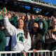 Image: Michigan State fans cheer  in the audience.