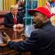 Then-President Donald Trump meets with rapper Kanye West in the Oval Office of the White House on Oct. 11, 2018.