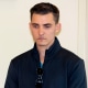Jack Burkman, left, and Jacob Wohl speak with reporters in Rosslyn, Virginia.