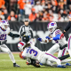 Image: Cincinnati Bengals wide receiver Tee Higgins (85) collides with Buffalo Bills safety Damar Hamlin (3) during the first half of an NFL football game on Jan. 2, 2023, in Cincinnati.