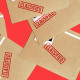 Photo illustration: Scattered paper folders with the stamp that reads,"Classified".