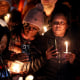 People attend a candlelight vigil in memory of Tyre Nichols at the Tobey Skate Park on January 26 in Memphis, Tenn.