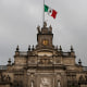 The Mexican national flag flies at half-mast on top of the Metropolitan Cathedral of Mexico City, Sept. 9, 2017.