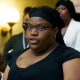 Brittany Lampkin speaks about the Mississippi Black Women's Roundtable legislative agenda  during a news conference at the Capitol in Jackson, Miss.